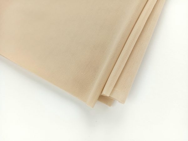 beige medium weight power mesh folded
