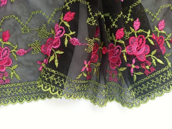 black stretch embroidered lace pink green symmetrical pattern